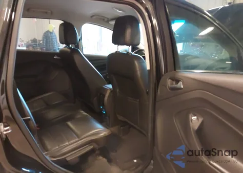 2014 Ford Escape Titanium z USA, uszkodzony, nr VIN 1FMCU9J96EUE11367